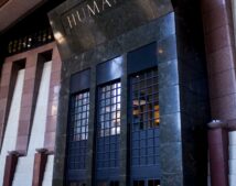 A large commercial facade and artistic glass doors