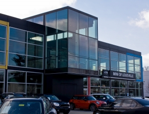 Glass windows and a glass facade on a car dealership