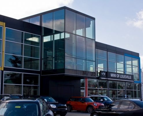 Glass windows and a glass facade on a car dealership